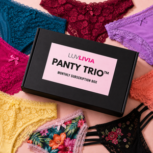 LUVLIVIA Panty Trio subscription box surrounded by colorful lace panties on a light background