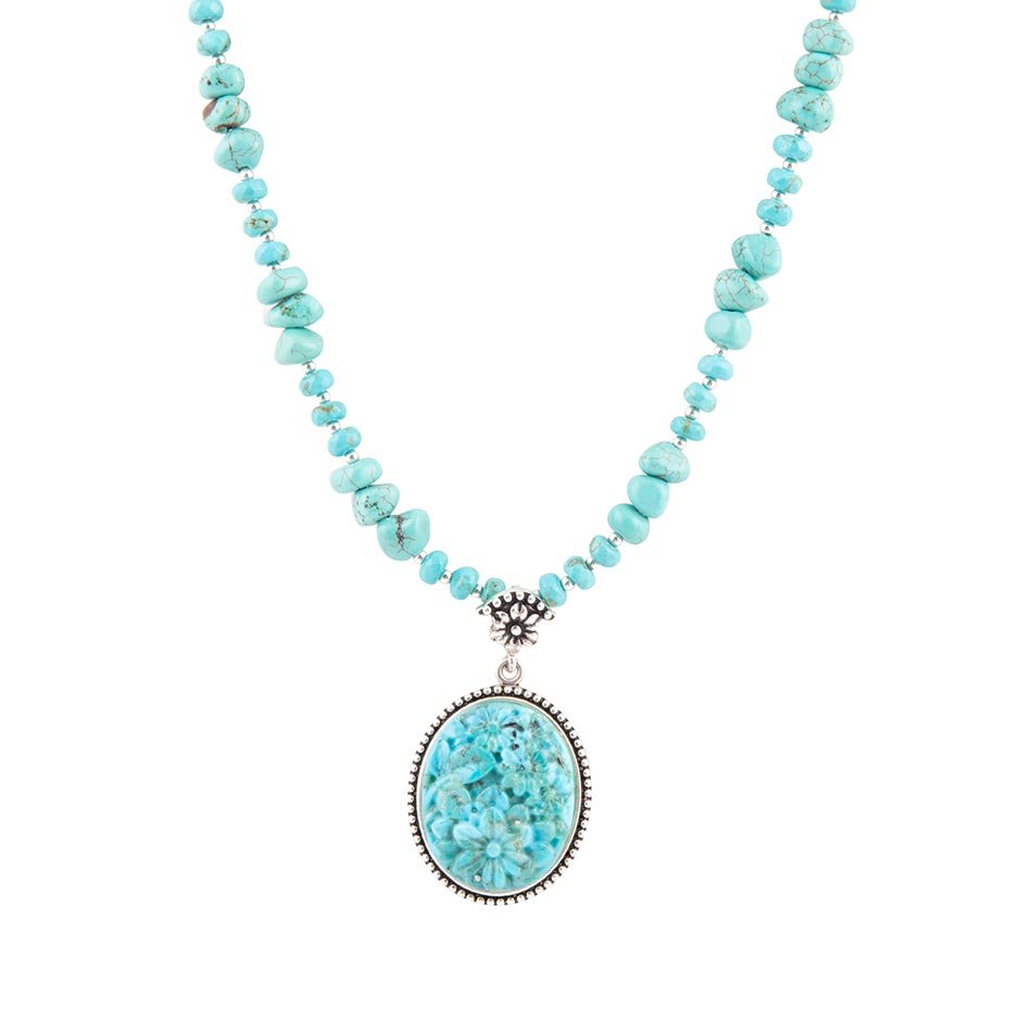 Carved Blue Turquoise and Sterling Silver Pendant